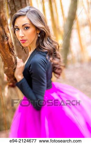 19 year old brunette woman in dance clothing on a path in a bamboo forest. View Large Photo Image Stock Photo - 19 year old brunette woman in dance clothing on a path in a bamboo forest.. Fotosearch