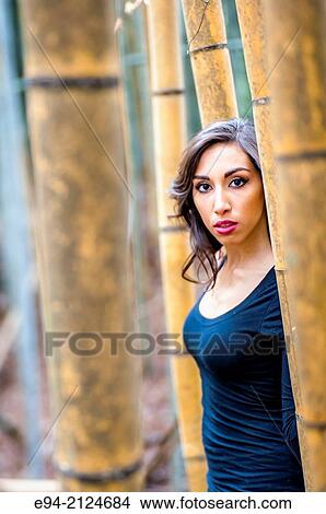 1Portrait of a19 year old brunette woman looking directly at the camera. View Large Photo Image Picture - 1Portrait of a19 year old brunette woman looking directly at the camera.. Fotosearch