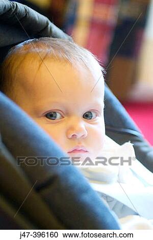 2 month old baby girl sitting in car seat, headshot, serious View Large Photo Image Stock Image - 2 month old baby girl sitting in car seat, headshot, serious. Fotosearch