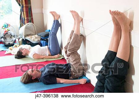 2 mothers in post natal yoga class with their babies View Large Photo Image Stock Photo - 2 mothers in post natal yoga class with their babies. Fotosearch