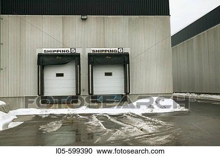 2 shipping doors to a warehouse View Large Photo Image Stock Image - 2 shipping doors to a warehouse. Fotosearch