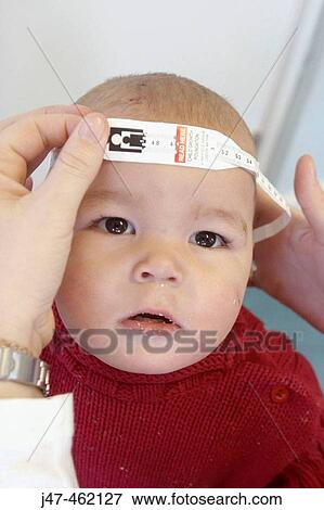 2 year old boy having his head measured View Large Photo Image Stock Photo - 2 year old boy having his head measured. Fotosearch