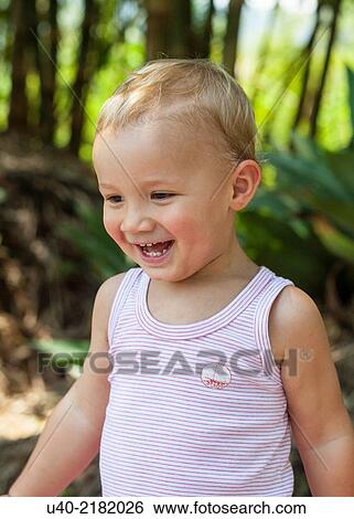Stock Photograph - 2 Year old boy laughing.. Fotosearch