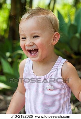 Stock Photography - 2 Year old boy laughing.. Fotosearch