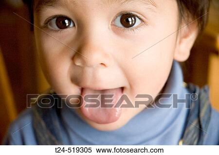 2 year old boy sticking out tongue, Flagstaff, Arizona USA View Large Photo Image Stock Photography - 2 year old boy sticking out tongue, Flagstaff, Arizona USA. Fotosearch