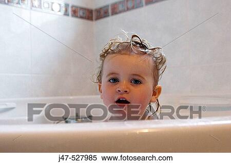 2 year old girl in the bath, smiling into camera View Large Photo Image Stock Photography - 2 year old girl in the bath, smiling into camera. Fotosearch