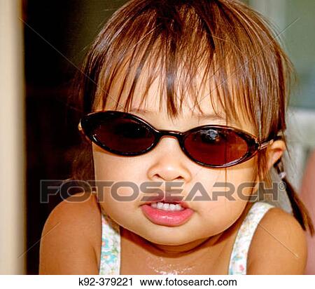 Stock Image - 2-year-old Vietnamese girl. Fotosearch