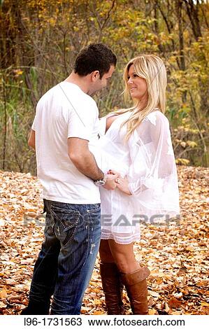 Stock Image - 20-25, engaged couple, caucasian. Fotosearch