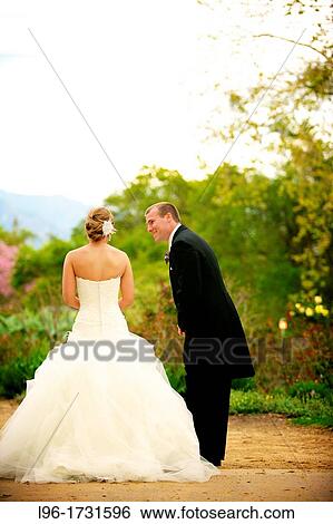 Stock Photograph - 20-30, caucasian, bride & groom, wedding. Fotosearch