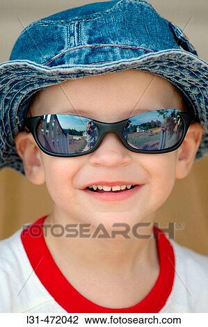 20 month old boy child baby with blue hat and sunglasses and some with mom View Large Photo Image Stock Image - 20 month old boy child baby with blue hat and sunglasses and some with mom. Fotosearch