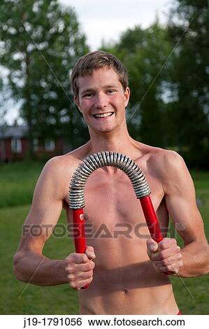 20 years old weight training View Large Photo Image Stock Photograph - 20 years old weight training. Fotosearch