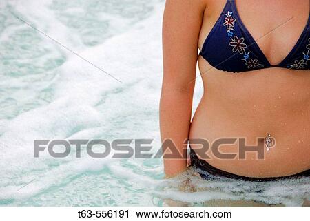 20 yr old woman standing in spa View Large Photo Image Stock Image - 20 yr old woman standing in spa. Fotosearch