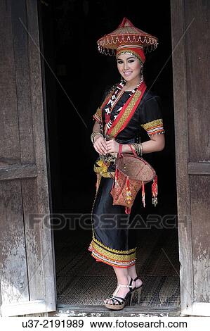 2014 Miss World Harvest at Sarawak Cultural Village wearing traditional native costumes. View Large Photo Image Stock Photo - 2014 Miss World Harvest at Sarawak Cultural Village wearing traditional native costumes.. Fotosearch