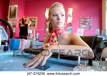21 year old, blonde girl in nail salon View Large Photo Image Stock Photography - 21 year old, blonde girl in nail salon. Fotosearch