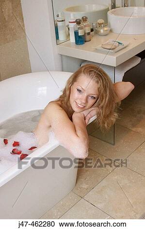 21 year old girl in the bath, leaning on the side View Large Photo Image Stock Image - 21 year old girl in the bath, leaning on the side. Fotosearch