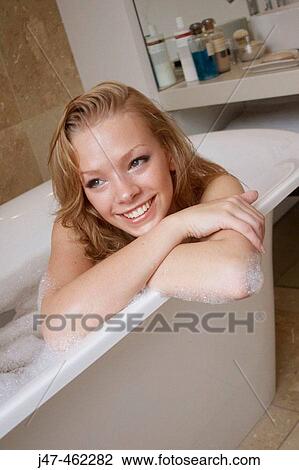 21 year old girl in the bath, leaning on the side, smiling View Large Photo Image Stock Image - 21 year old girl in the bath, leaning on the side, smiling. Fotosearch