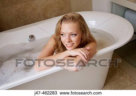 21 year old girl in the bath, leaning on the side, smiling View Large Photo Image Stock Image - 21 year old girl in the bath, leaning on the side, smiling. Fotosearch