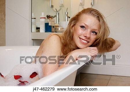 21 year old girl in the bath, leaning on the side, smiling View Large Photo Image Stock Photo - 21 year old girl in the bath, leaning on the side, smiling. Fotosearch