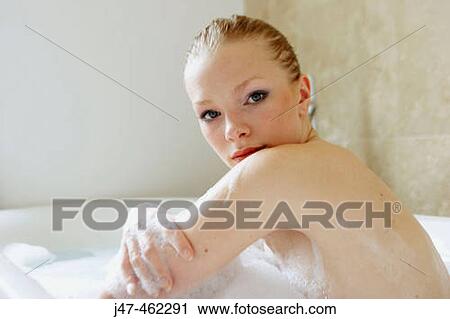 21 year old girl in the bath, looking over her shoulder, pensively. View Large Photo Image Stock Image - 21 year old girl in the bath, looking over her shoulder, pensively.. Fotosearch