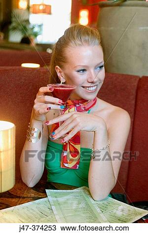 21 year old, holding a cocktail View Large Photo Image Stock Image - 21 year old, holding a cocktail. Fotosearch