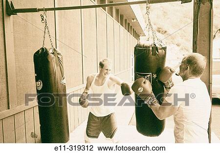 21 year old man boxing View Large Photo Image Stock Image - 21 year old man boxing. Fotosearch