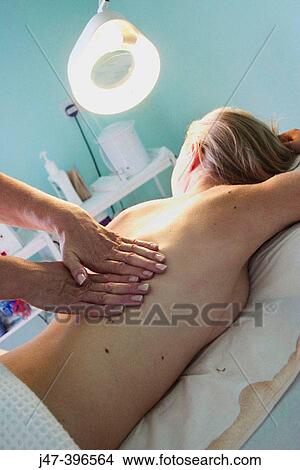 21 year old woman having a massage at the beauty therapy salon View Large Photo Image Picture - 21 year old woman having a massage at the beauty therapy salon. Fotosearch