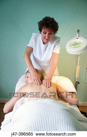 21 year old woman having a massage at the beauty therapy salon View Large Photo Image Stock Photography - 21 year old woman having a massage at the beauty therapy salon. Fotosearch