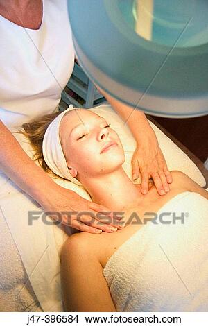 21 year old woman having shoulder massage, by a beauty therapist View Large Photo Image Picture - 21 year old woman having shoulder massage, by a beauty therapist. Fotosearch