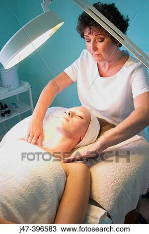 21 year old woman having shoulder massage, by a beauty therapist View Large Photo Image Stock Image - 21 year old woman having shoulder massage, by a beauty therapist. Fotosearch