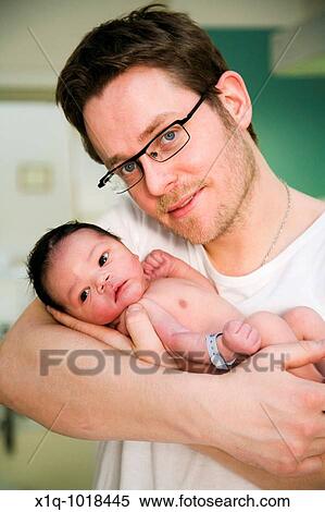 22 hours old boy with his father at the maternity ward View Large Photo Image Stock Photography - 22 hours old boy with his father at the maternity ward. Fotosearch