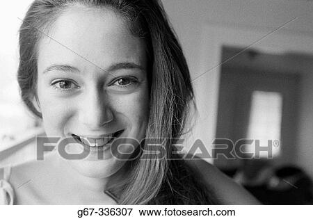 Stock Photo - 22 years old model at home. California. USA.. Fotosearch