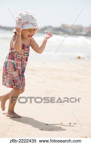 23 months old baby girl playing at the beach, Corrubedo, Galicia, Spain,. View Large Photo Image Stock Photography - 23 months old baby girl playing at the beach, Corrubedo, Galicia, Spain,.. Fotosearch
