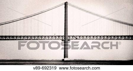 Stock Photo - 25 of April Bridge over Tagus River. Lisbon, Portugal. Fotosearch