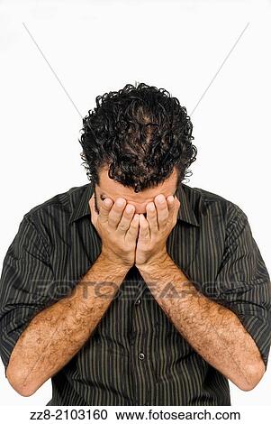 25 years old Middle Eastern man crying with head in hands. View Large Photo Image Stock Image - 25 years old Middle Eastern man crying with head in hands.. Fotosearch