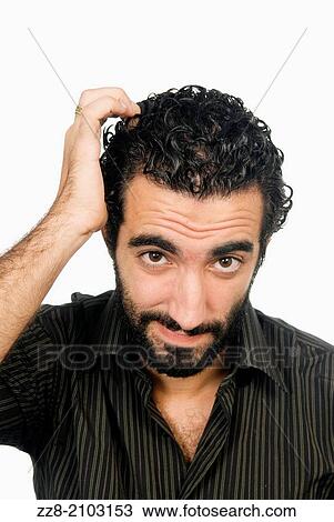 25 years old Middle Eastern man confused and scratching his head. View Large Photo Image Stock Image - 25 years old Middle Eastern man confused and scratching his head.. Fotosearch