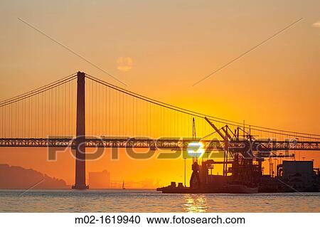 25th April Bridge inTagus river, Lisbon, Portugal View Large Photo Image Stock Image - 25th April Bridge inTagus river, Lisbon, Portugal. Fotosearch