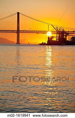 25th April Bridge inTagus river, Lisbon, Portugal View Large Photo Image Stock Image - 25th April Bridge inTagus river, Lisbon, Portugal. Fotosearch