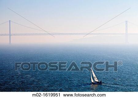 25th April Bridge inTagus river, Lisbon, Portugal View Large Photo Image Stock Image - 25th April Bridge inTagus river, Lisbon, Portugal. Fotosearch