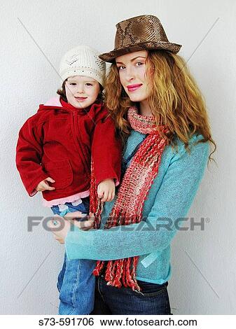 27 year old woman and her 3 year old daughter. View Large Photo Image Stock Photograph - 27 year old woman and her 3 year old daughter.. Fotosearch