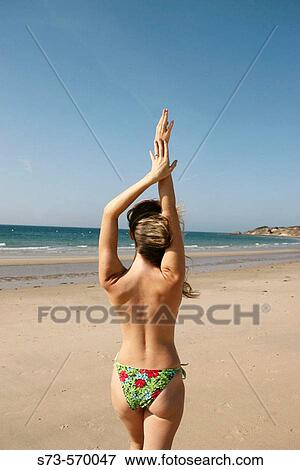 27 year old woman on beach View Large Photo Image Stock Photo - 27 year old woman on beach. Fotosearch