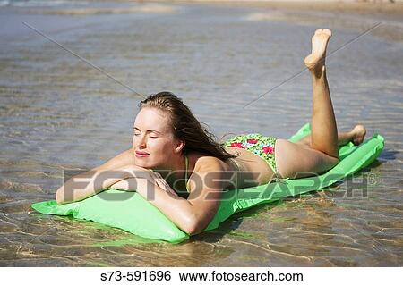 27 year old woman on beach View Large Photo Image Stock Photograph - 27 year old woman on beach. Fotosearch