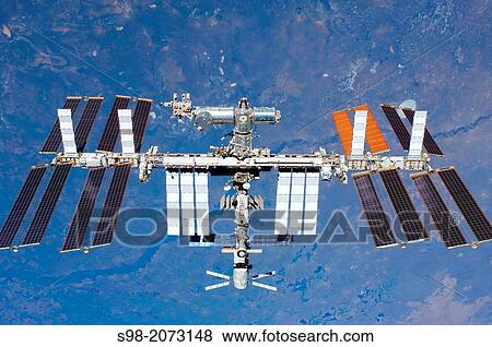 Stock Photo - (29 May 2011) -- The International Space Station is featured in this image photographed by an STS-134 crew member on the space shuttle Endeavour after the station and shuttle began their post-undocking relative separation.. Fotosearch