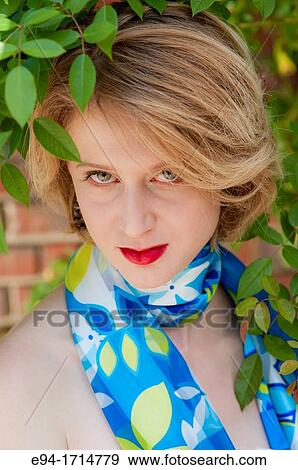 29 year old blond woman in a garden setting View Large Photo Image Stock Photo - 29 year old blond woman in a garden setting. Fotosearch