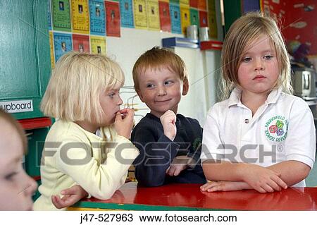 3, 3-4 year old children standing together at nursery View Large Photo Image Stock Image - 3, 3-4 year old children standing together at nursery. Fotosearch