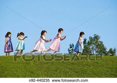 3-6 year old Chinese girls from the Chicago area. Shot near dusk in Naperville park. Illinois. USA. View Large Photo Image Stock Photography - 3-6 year old Chinese girls from the Chicago area. Shot near dusk in Naperville park. Illinois. USA.. Fotosearch