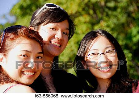 3 asian women standing together smiling View Large Photo Image Stock Photography - 3 asian women standing together smiling. Fotosearch