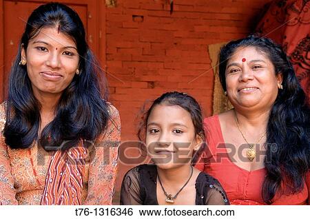 Stock Photograph - 3 generations of women in Kathmandu, Nepal. Fotosearch