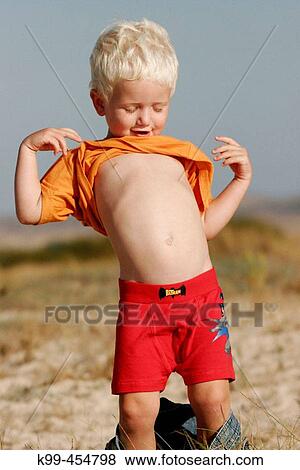 3 year old blond boy playing View Large Photo Image Stock Photo - 3 year old blond boy playing. Fotosearch