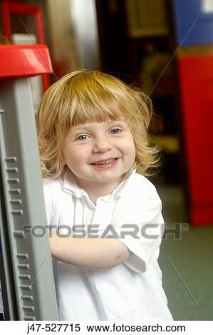 3 year old boy from Pakistan smiling into camera at nursery View Large Photo Image Stock Photography - 3 year old boy from Pakistan smiling into camera at nursery. Fotosearch