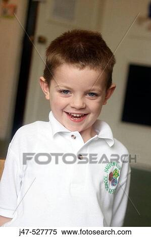 3 year old boy laughing into camera at nursery View Large Photo Image Stock Photography - 3 year old boy laughing into camera at nursery. Fotosearch